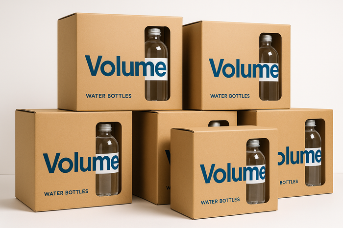 boxes of water bottles with a cool logo saying volume